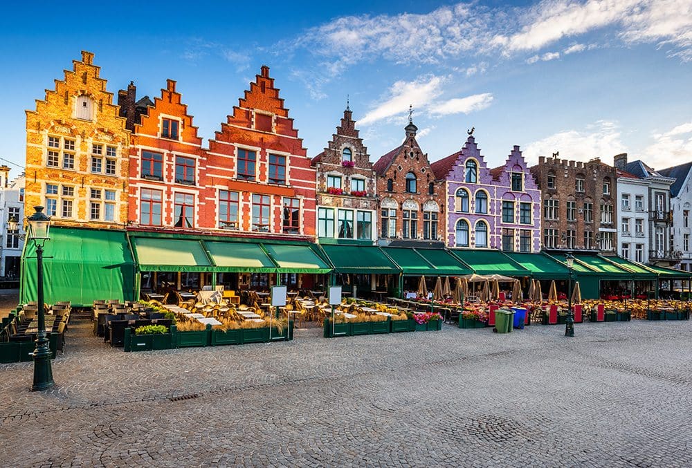 The colorful Markt square in Bruges Belgium